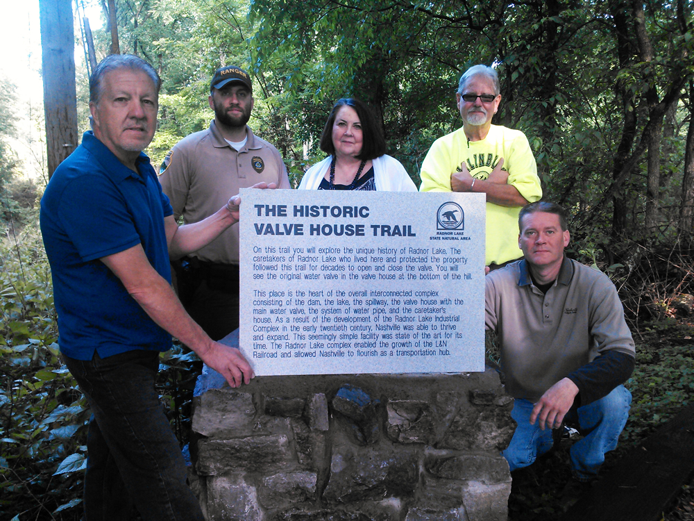 Valve House trail signage being installed